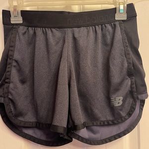 New Balance XS charcoal gray and black athletic shorts